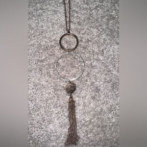 Elegant Gold and White Tassel Pendant